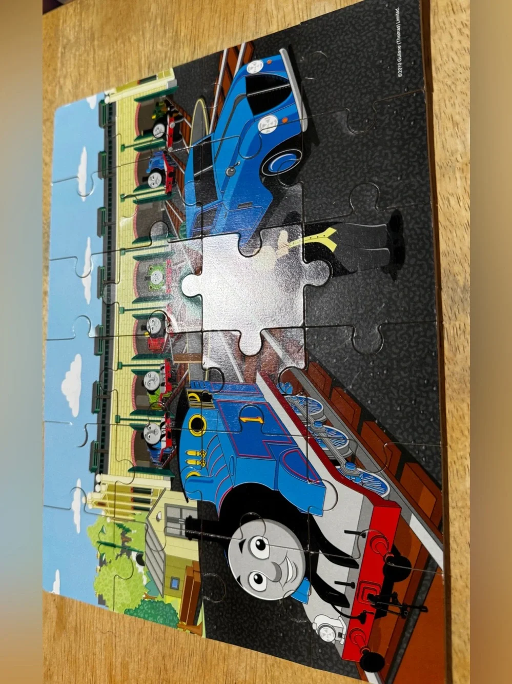 Thomas & Friends Colorful Blue Train Puzzle Pieces in Wood Organizer